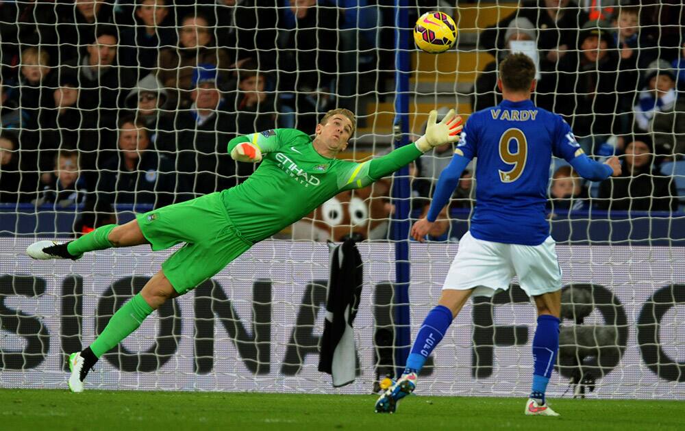 Manchester City's Joe Hart watches the ball go wide during the English Premier League soccer match between Leicester City and Manchester City at King Power Stadium, in Leicester, England.