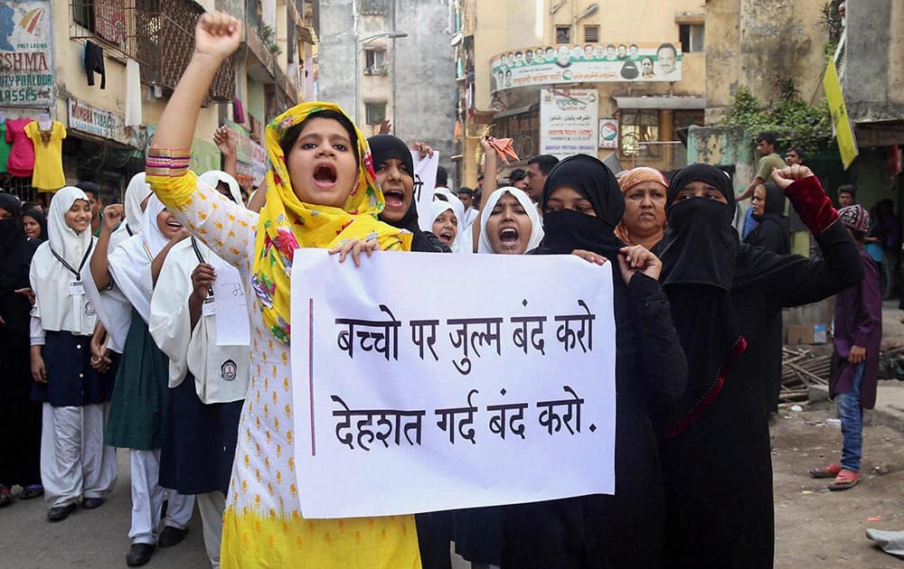 School girls holding placards during a protest rally in Thane on Wednesday against the Pakistan terror attack on School students.