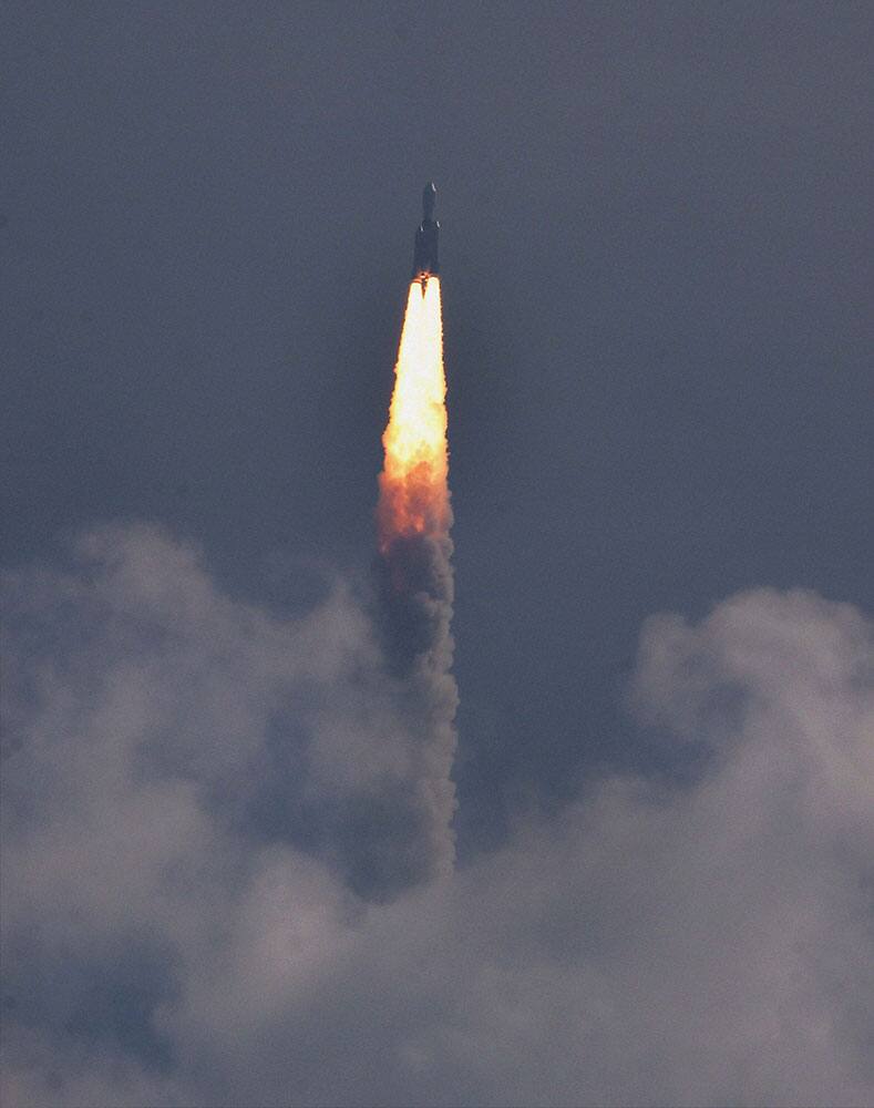 Indian Space Research Organisation's GSLV-Mark III rocket lifts off during a test flight carrying CARE (Crew Module Atmospheric Re-entry Experiment) Crew module from Sriharikota.