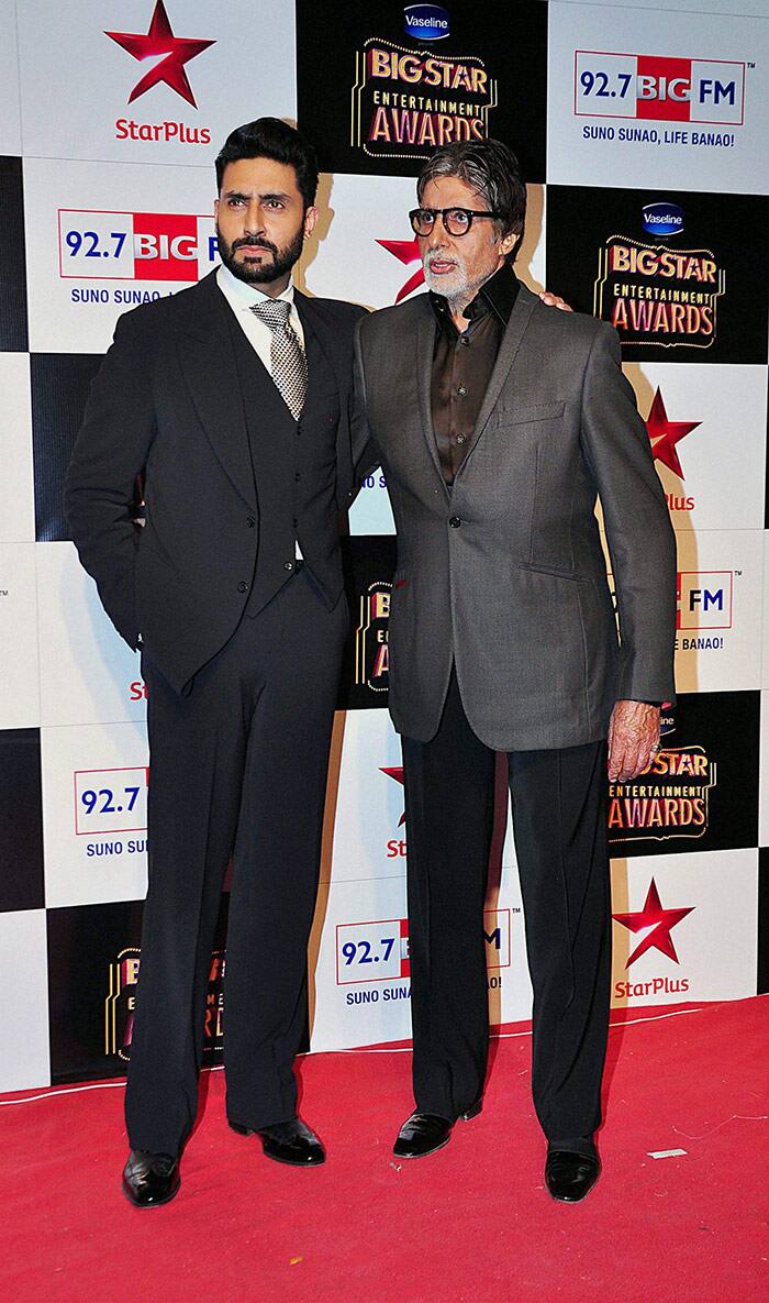 Amitabh Bachchan and Abhishek Bachchan at an Awards function in Mumbai.