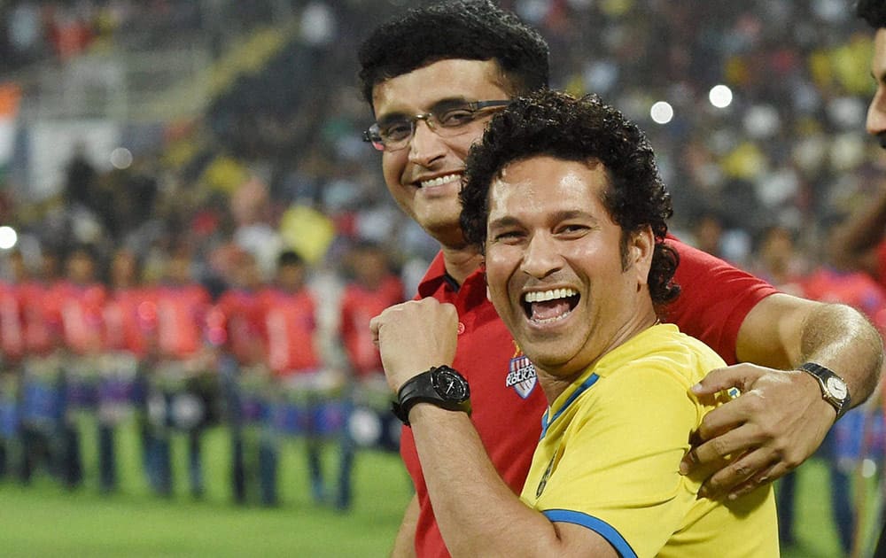 Kerala Blaster FC team owner Sachin Tendulkar along with Atletico De Kolkata owner Saurav Ganguly during the final match of Hero Indian Super League in Mumbai.