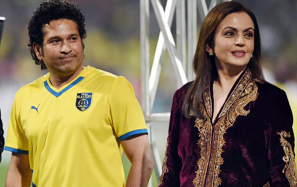 Crickter and owner of Kerla Blasters FC Sachin Tendulkar along with Neeta Ambani during the final match of the Indian Super League in Mumbai.