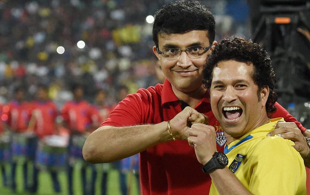 Kerala Blaster FC team owner Sachin Tendulkar along with Atletico De Kolkata owner Saurav Ganguly during the final match of Hero Indian Super League in Mumbai.