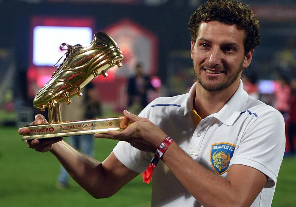 Chennayin FC player Elano Blumer poses to the media after receiving the Golden Boot award during the Indian Super League final match in Navi Mumbai.