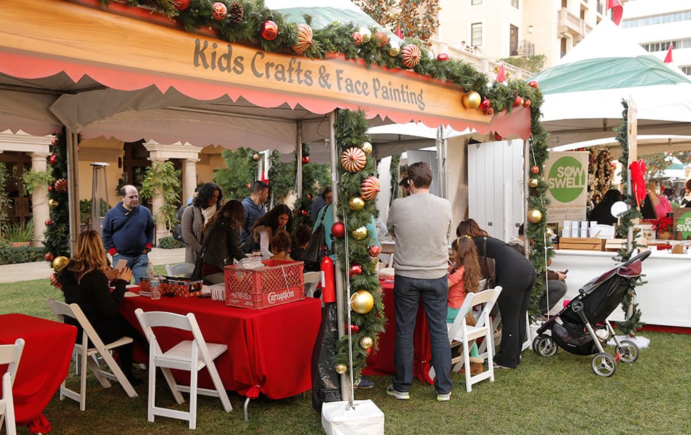 The Kids Crafts and Face Painting Booth at the Beverly Hills Holiday Bazaar.