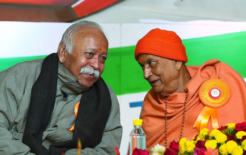 RSS Chief Mohan Bhagwat with Swami Satyamitranand Giriji Maharaj during the Vanvasi Raksha Parivar Kumbh 2014 in New Delhi.