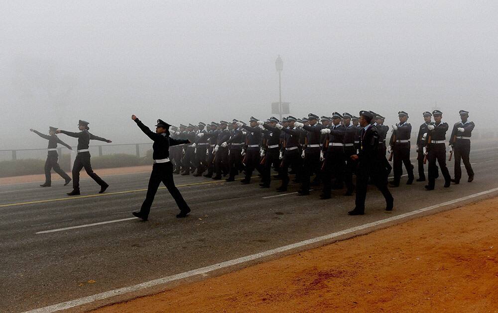  IAF soldiers march during a rehearsal for the upcoming Republic Day parade in New Delhi on Monday.