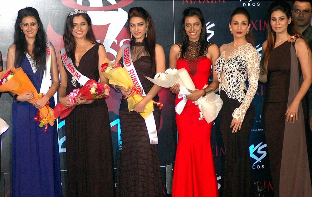  Bollywood Actress Malaika Arora Khan with winner contestants of Kamasutra Miss Maxim 2015.