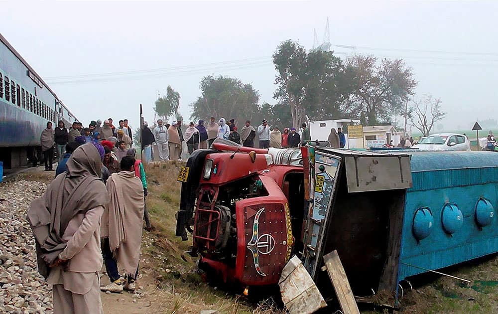 An overturned truck after its collision with Satluj Express Train in Jalandhar.