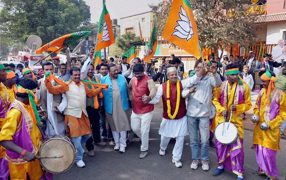 BJP Party workers celebrate after Jharkhand Assembly Election results declared , at state party office, Harmu in Ranchi.