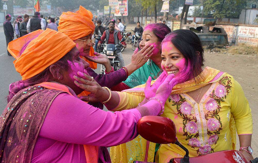 BJP workers celebrate after Jharkhand assembly result in Dhanbad.