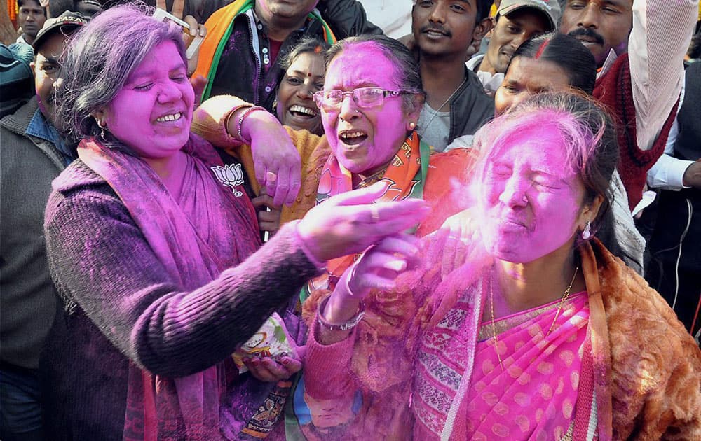 Women wing of BJP celebrate after Jharkhand Assembly results got declared at state party office, in Ranchi.