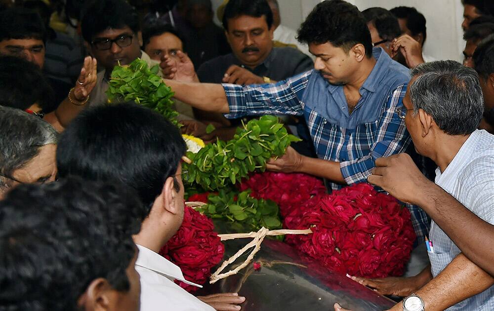 Actor Vijay pays his last respects at the funeral of Dadasaheb Phalke Award winner and veteran film director K Balachander, at his residence in Chennai.