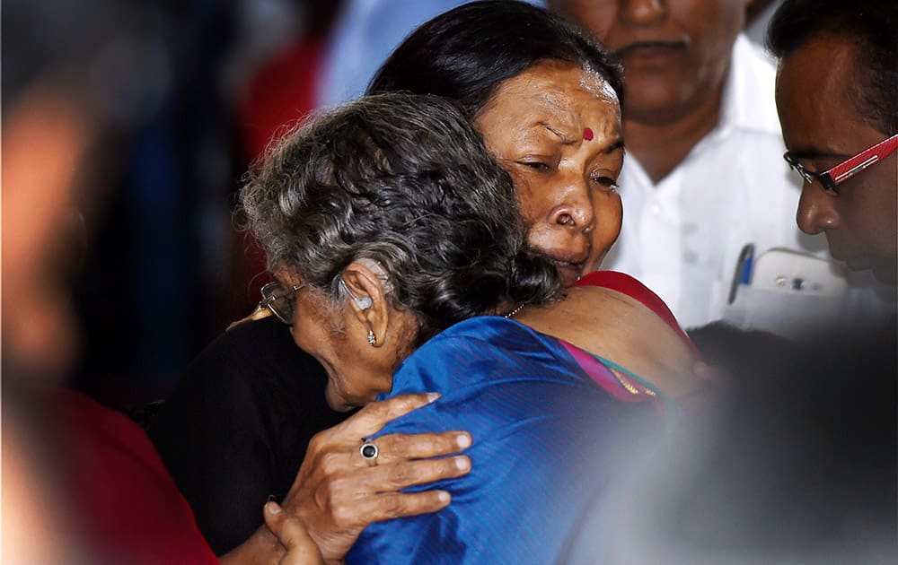 Director K Balachanders wife Sulakshana, is consoled by veteran actress Manorama after paying her last respects at the funeral of Dadasaheb Phalke Award winner and veteran film director K Balachander, at his residence in Chennai.