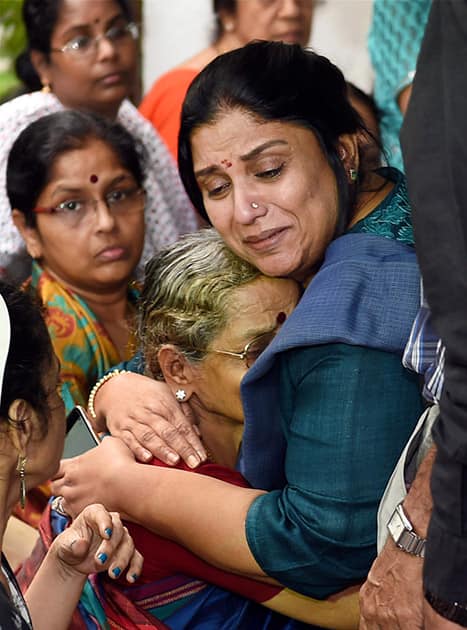 Director K Balachanders wife Sulakshana, is consoled by actress Sripriya after pay her last respects at the funeral of Dadasaheb Phalke Award winner and veteran film director K Balachander, at his residence in Chennai.