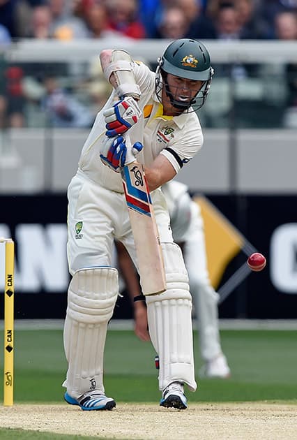 Australia's Chris Rogers bats against India during their play on day one of the third cricket test in Melbourne.