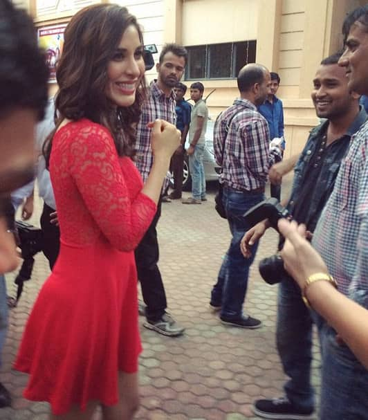 sophiechoudry :- Arriving at the press meet for #CountryClubIndia to talk about my 31st nite performance in #Pune ! #NewYears #Live #Excited #LittleRedDress @hm - Instagram