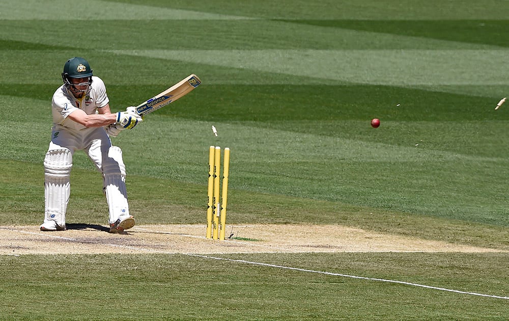 Steve Smith is bowled for 192 runs against India on the second day of their cricket test match in Melbourne, Australia.