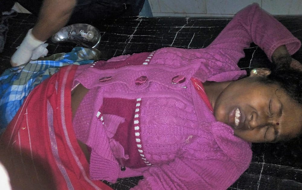 An injured person is treated at a hospital in Kokrajhar district, in northeast state of Assam.