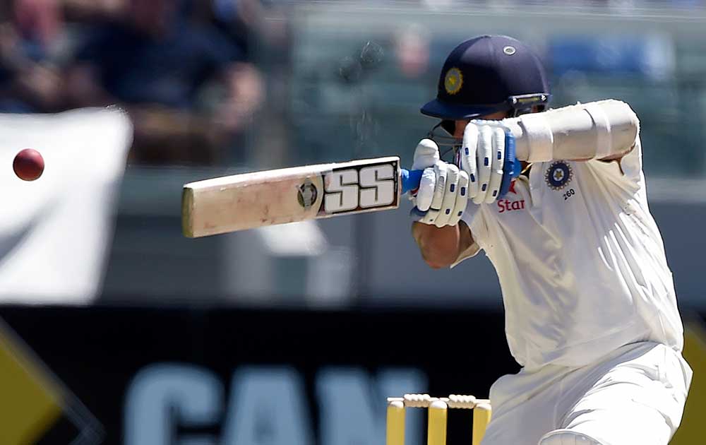 India's Murali Vijay edges the ball to be caught in slips for 68 runs against Australia on the third day of their cricket test match in Melbourne, Australia.