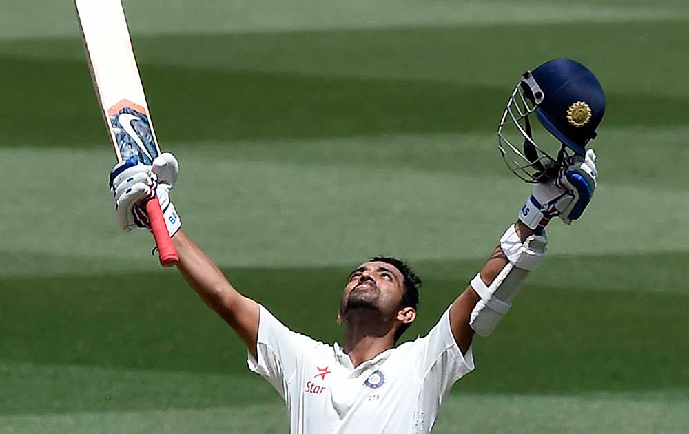 India's Ajinkya Rahane celebrates making 100 runs against Australia on the third day of their cricket test match in Melbourne, Australia.