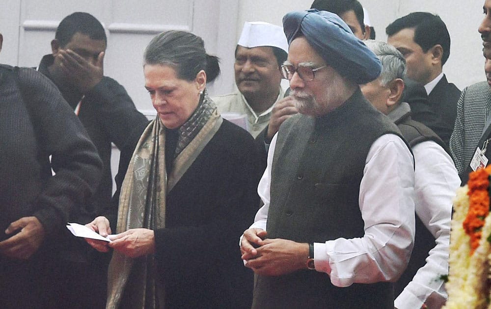 Congress president Sonia Gandhi with Former Prime Minister Manmohan Singh at the partys 130th foundation day function at AICC headquarters.