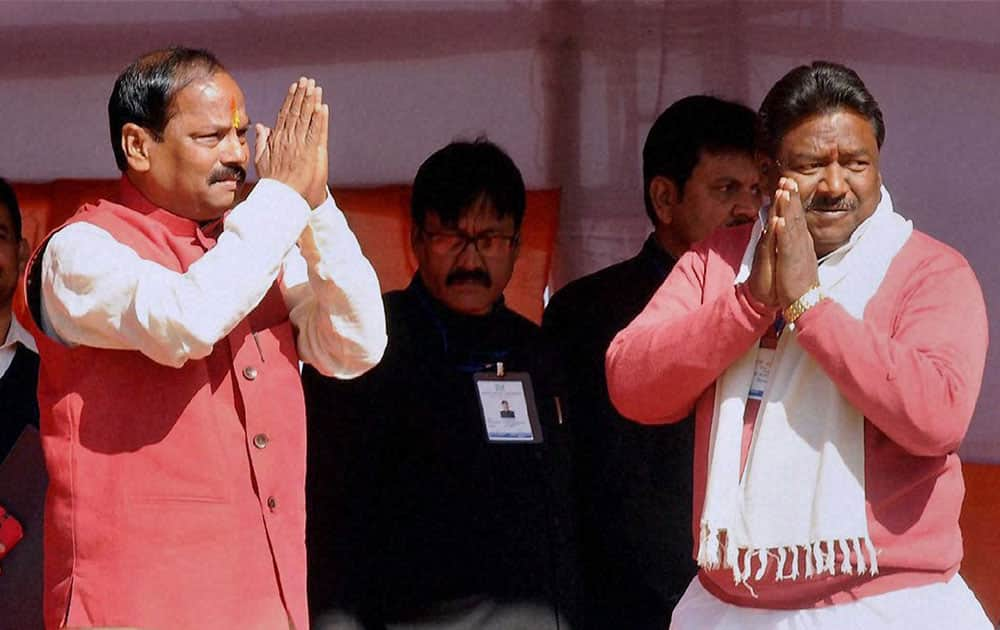 Jharkhand Chief Minister Raghubar Das with Minister Nilkath Singh Munda after the swearing in ceremony in Ranchi.