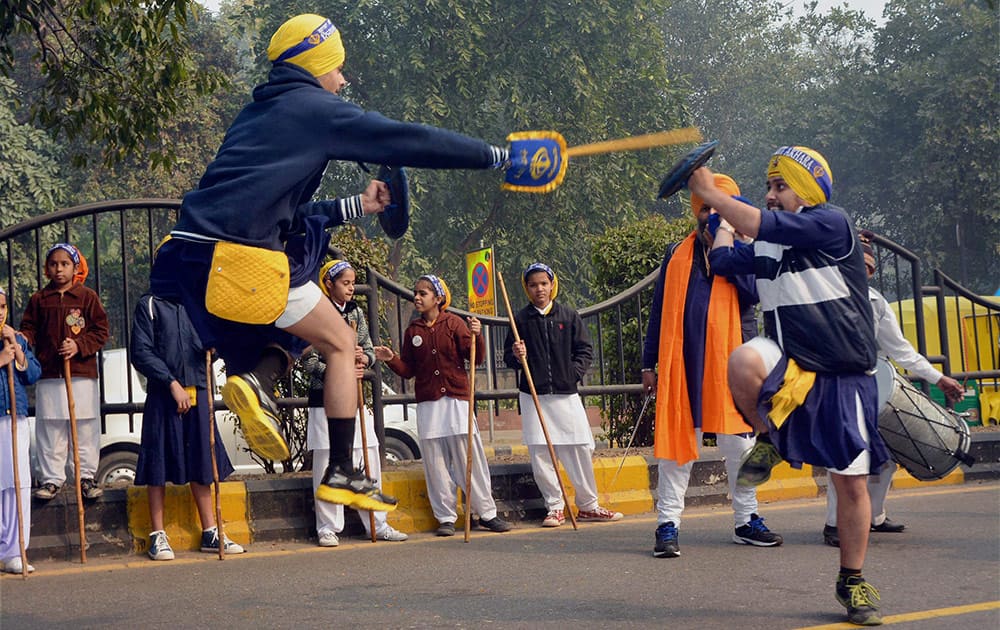 Sikh devotees at a Nagar Kirtan on the birth anniversary of Guru Gobind Singh in New Delhi.