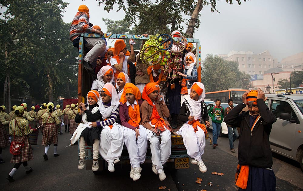 Indian Sikhs participate in a religious procession to mark the birth anniversary of Guru Gobind Singh, the tenth Sikh guru, in New Delhi.