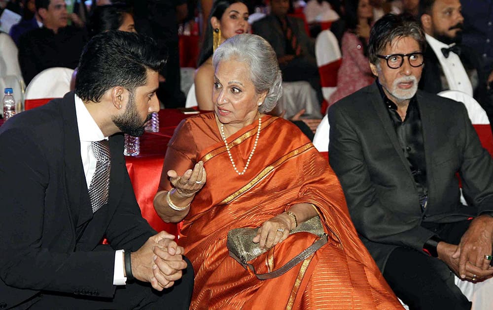 Bollywood actors Amitabh Bachchan with Waheeda Rehman and Abhishek Bachchan during the BIG STAR Entertainment Awards 2014 in Mumbai.