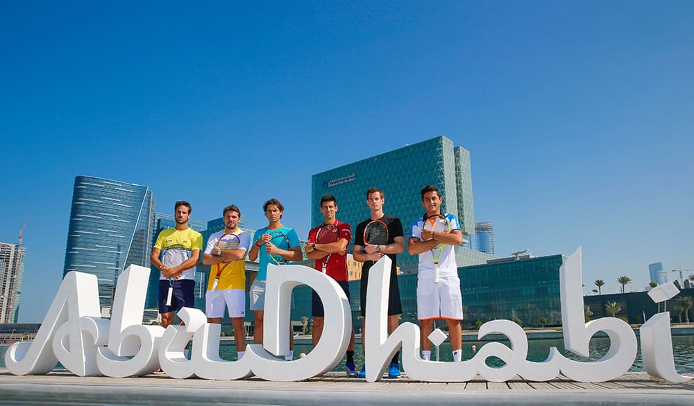 This image released by the Mubadala World Tennis Championship, Feliciano Lopez, Stan Wawrinka, Rafael Nadal, Novak Djokovic, Andy Murray and Nicolas Almagro pose at the UAE capital’s Central Business District, Al Maryah Island in Abu Dhabi, United Arab Emirates.
