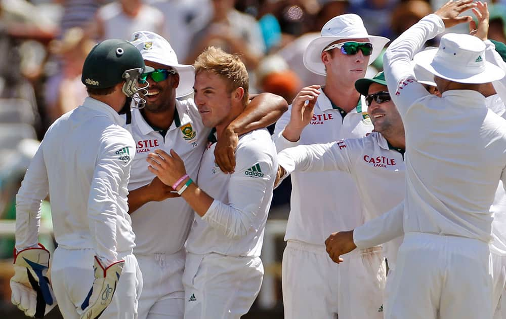 South Africa's Stiaan van Zyl, celebrates after they take the wicket of West Indies player Marlon Samuels during their third test in Cape Town, South Africa.