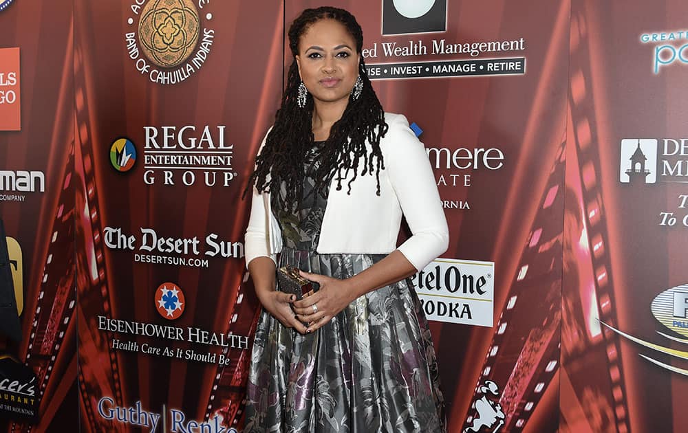 Ava DuVernay poses at the Palm Springs International Film Festival opening night screening of SELMA at Palm Springs High School.