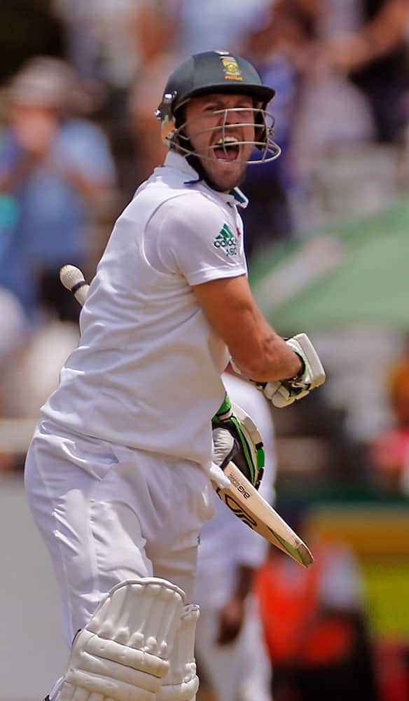 South Africa's AB de Villiers celebrates as he makes hundred runs during the third test game against against West Indies in Cape Town, South Africa.