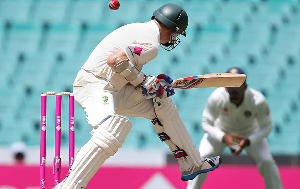 Australia's Chris Rogers is hit by a delivery from India's Mohammad Shami during their cricket test match at the Sydney Cricket Ground in Sydney.