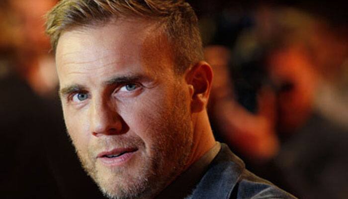 Gary Barlow offers to sing at three fans&#039; weddings