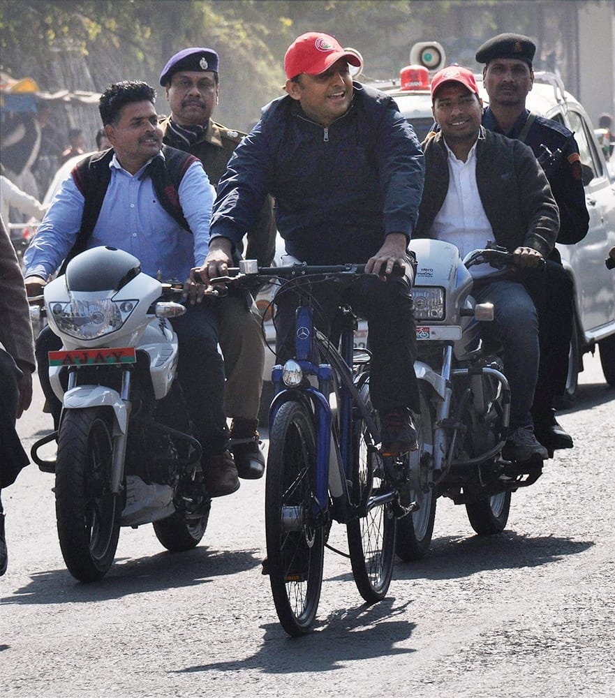 UP Chief Minister Akhilesh Yadav pedals a cycle during the ongoing Saifai Mahotsav in Etawah.