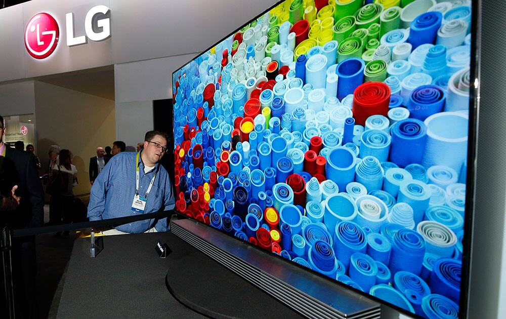 Brian Benson eyes the slim depth of the LG 65