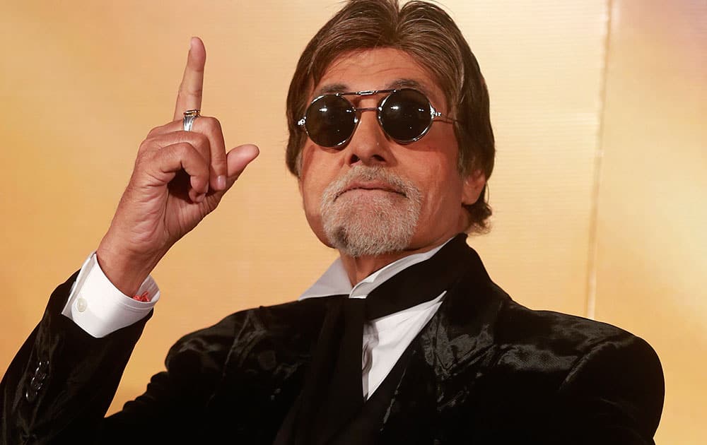 Bollywood superstar Amitabh Bachchan gestures during the trailer launch of his upcoming film 