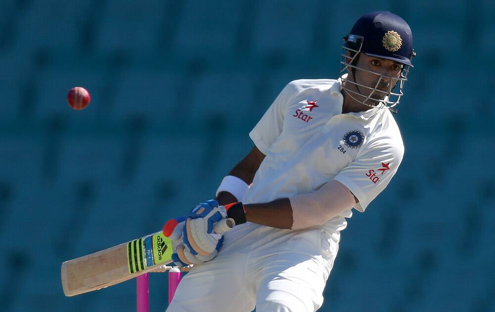 India's Lokesh Rahul ducks under a bouncer from Australia's Mitchell Starc on the second day of their cricket test match in Sydney.
