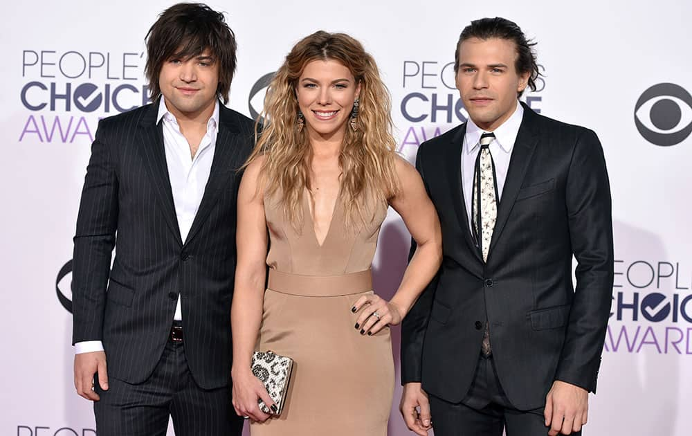 Reid Perry, from left, Kimberly Perry and Neil Perry of The Band Perry arrive at the People's Choice Awards at the Nokia Theatre.