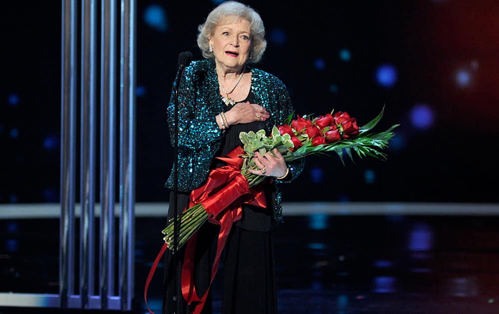 Betty White accepts the award for favorite TV icon at the People's Choice Awards at the Nokia Theatre.