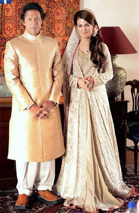 Pakistans cricketer-turned-politician Imran Khan and TV anchor Reham Khan pose for photographs after their marriage in Bani Gala, Pakistan.
