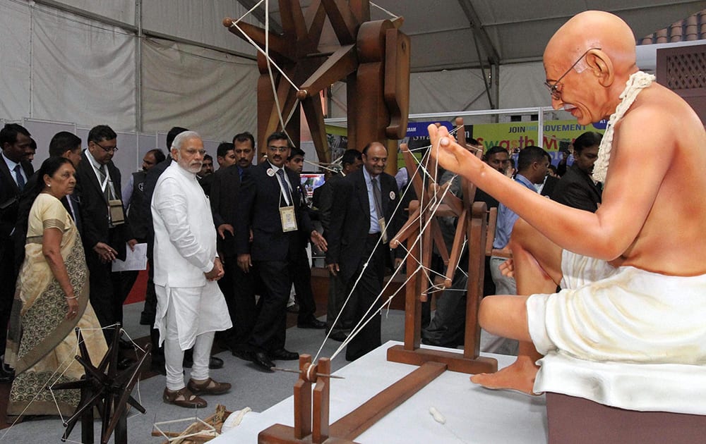 Prime Minister Narendra Modi and Gujarat Chief Minister Anandiben Patel visit the Global trade show during Pravasi Bhartiya Divas in Gandhinagar.