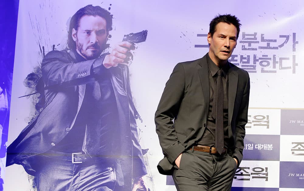 Actor Keanu Reeves poses for the media during a press conference for his new movie 'John Wick' in Seoul, South Korea. The movie is to be released in South Korea on Jan. 21.