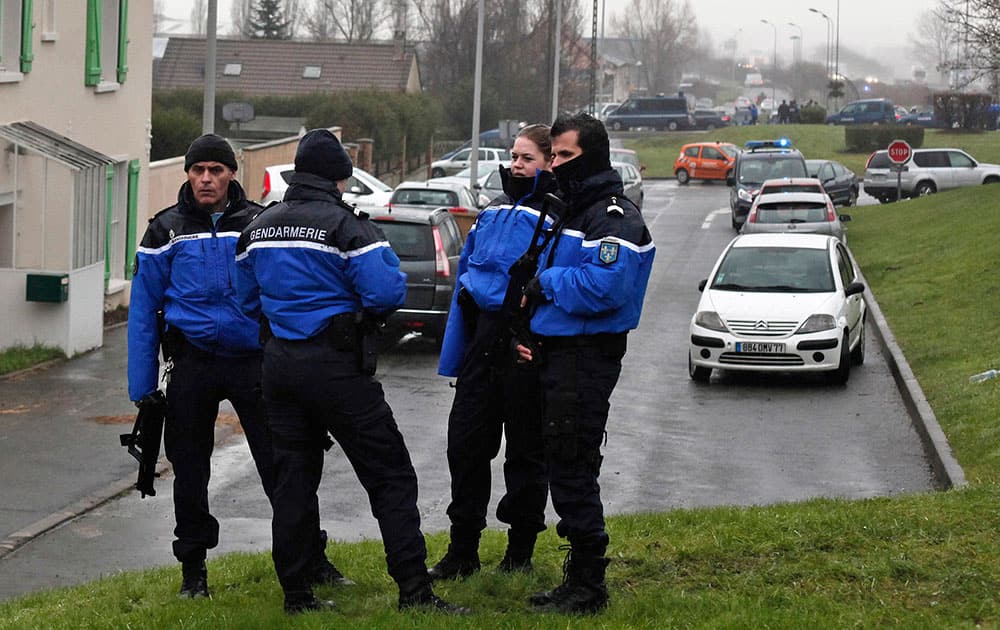Police officers control the access to Dammartin-en-Goele, northeast of Paris.