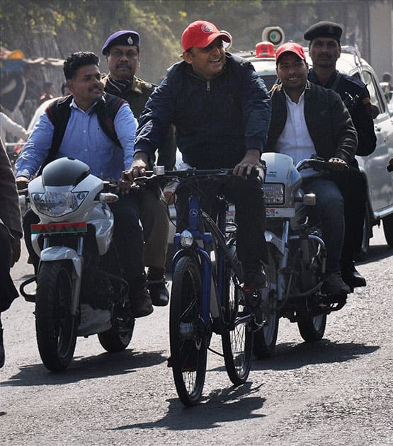 UP Chief Minister Akhilesh Yadav pedals a cycle during the ongoing Saifai Mahotsav in Etawah.