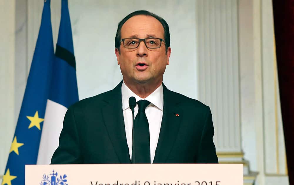 French President Francois Hollande addresses the nation at the Elysee Palace in Paris.