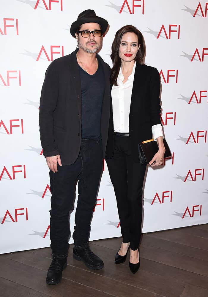 Brad Pitt and Angelina Jolie arrive at the AFI Awards at The Four Seasons Hotel, in Los Angeles.