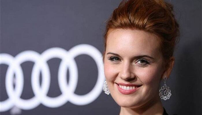 Actress Maggie Grace colours hair red